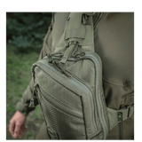 M-Tac Sling Pistoltaske Elite Hex, kestävä Cordura 1000D -laukku säädettävällä olkahihnalla ja YKK-vedoketjuilla, piilotettuun kuljetukseen.