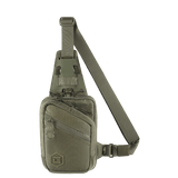 M-Tac Sling Pistoltaske Elite Hex kestävässä Cordura-materiaalissa, säädettävä hihna ja tilavat osastot.