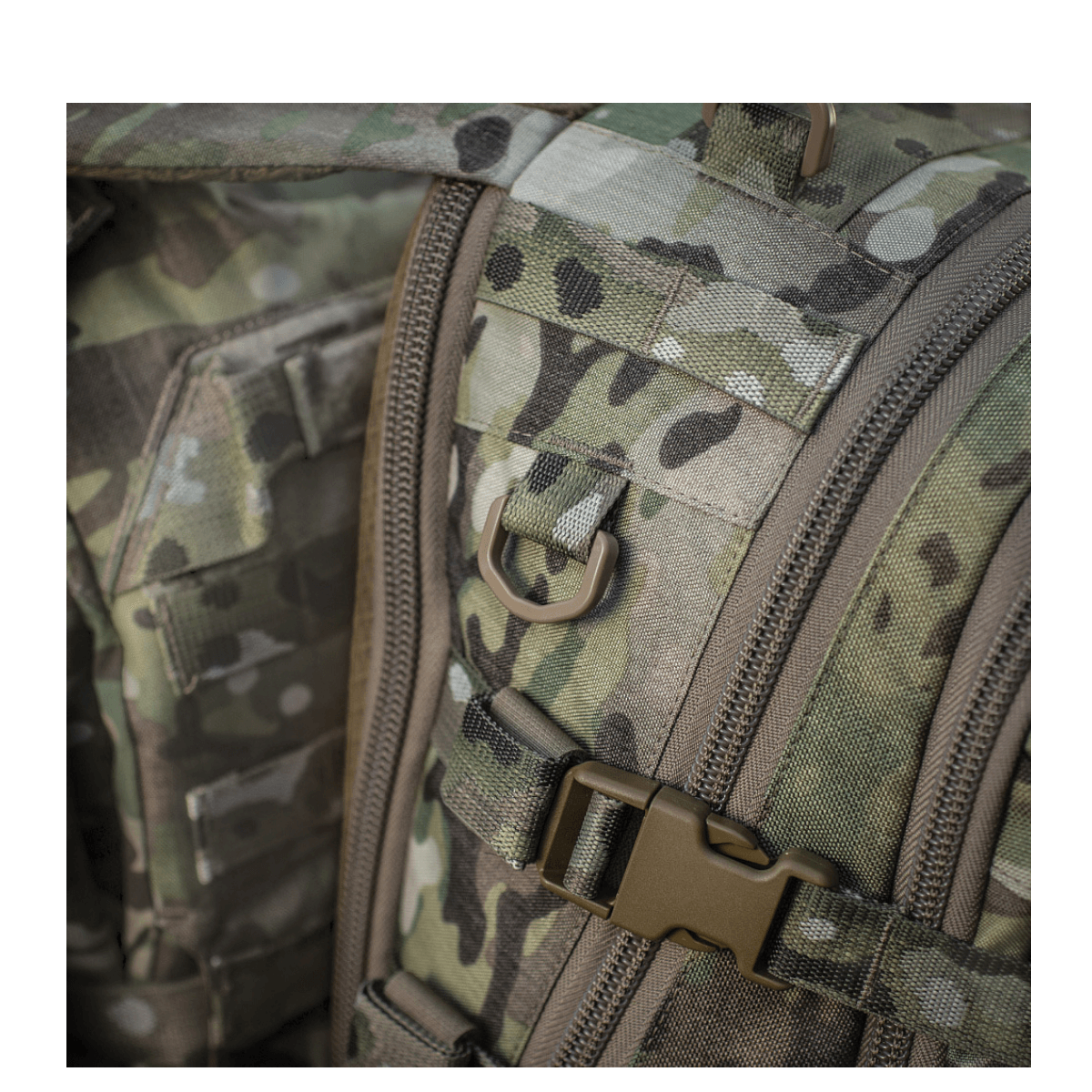 Lähikuva M-Tac Mission Pack Elite -repusta, Cordura 1000D camo-kuvio ja MOLLE LASER CUT-system.