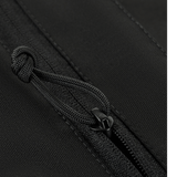 M-Tac Konvert Taske Elite sulkemisen yksityiskohta, magneettikiinnitys ja Cordura-materiaali.