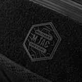 Lähikuva M‑Tac Bæltetaske Elite Hexistä, näkyvissä logo, musta Cordura-kangas, Woojin-soljet ja vesitiivis YKK-vetoketju.