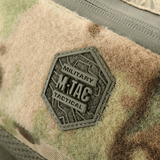 Merkki M‑Tac Elite Hex -vyölaukussa sotilasinspiroitulla muotoilulla ja Hex-logolla. Robusti Cordura-materiaali sotilaalliseen ilmeeseen.