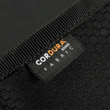 Lähikuva M-Tac Pung Elite Gen.II Hexistä Cordura Hex 1000D -kankaasta näkyvällä merkinnällä.