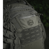 M-Tac Mission Rygsæk Elite Hex -reppu Cordura 1000D:llä, tyylikäs muotoilu ja MOLLE LASER CUT -järjestelmä lisätaskuja varten.
