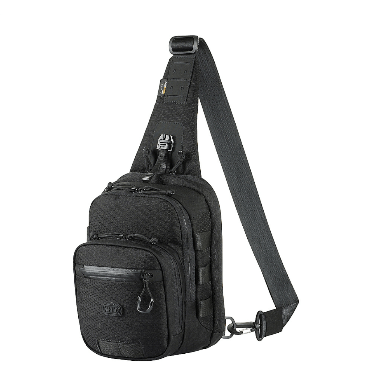 M-Tac Cross Taske Slim Elite Hex mustassa Cordura-materiaalissa, säädettävällä remmillä ja kestävillä YKK-vetoketjuilla, tyylikäs ja käytännöllinen päivittäiseen käyttöön.