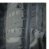 M-Tac reppu Large Elite Hex Gen. IV, kuva tiiviistä materiaalista ja vetoketjuista, robusti Cordura 500D- ja Hex 1000 -design.