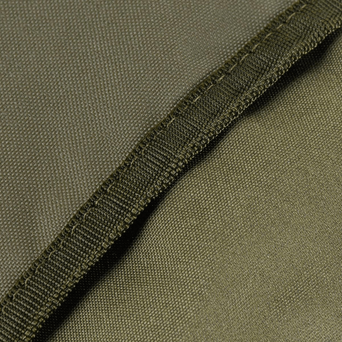 Lähikuva M-Tac Pouch Sukharka Gen.3 XL:n Cordura 500D -materiaalista oliivinvihreänä.