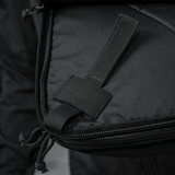 Yksityiskohta M-Tac Tablet Bag Laser Cut Hexistä vetoketjulla ja kahvalla, valmistettu Cordura-kankaasta.