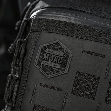 M-Tac Tablet Bag Laser Cut Hex vahvalla kuusikulmio-kuviolla ja Laser Cut MOLLE -paneelilla EDC:lle ja piilotuskantoon. Valmistettu kestävästä Cordurasta.