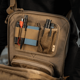 M-Tac Tablet Bag Laser Cut Hex tabletin, asiakirjojen ja varusteiden lokeroilla. Litteä ja käytännöllinen laukku Cordura-materiaalilla ja Laser Cut MOLLE -etupaneelilla.