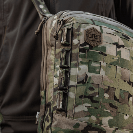 M-Tac Tablet Bag Laser Cut Hex camokuvio, Cordura-materiaali ja Laser Cut MOLLE -järjestelmä taktiikkaan ja arkeen.