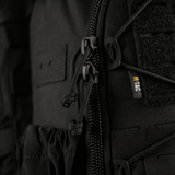 M-Tac STURM Elite -reppu laserleikatuilla MOLLE-etupaneeleilla, lähikuva vetoketjusta ja yksityiskohdista, Cordura-materiaalia.
