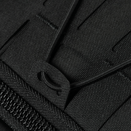 Yksityiskohta M-Tac STURM Elite -repusta Cordura-kankaalla ja tukevilla vetoketjuilla taktiseen käyttöön.
