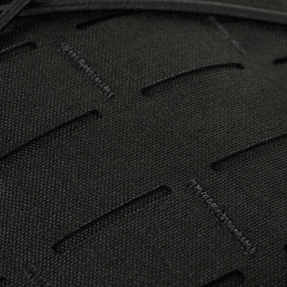 Yksityiskohta M-Tac STURM Elite -repusta MOLLE laser cut -paneelilla, valmistettu Cordura-materiaalista.