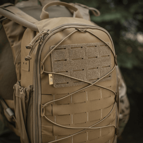 M-Tac STURM Elite -reppu Cordura-materiaalista MOLLE Laser Cut -paneelilla ja joustavilla sivutaskuilla, taktiseen käyttöön.