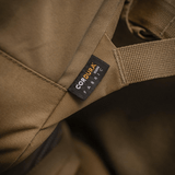 Lähikuva M-Tac STURM Elite -repusta Cordura-kangasmerkillä, joka osoittaa korkean laadun ja kulutuskestävyyden muotoilussa.
