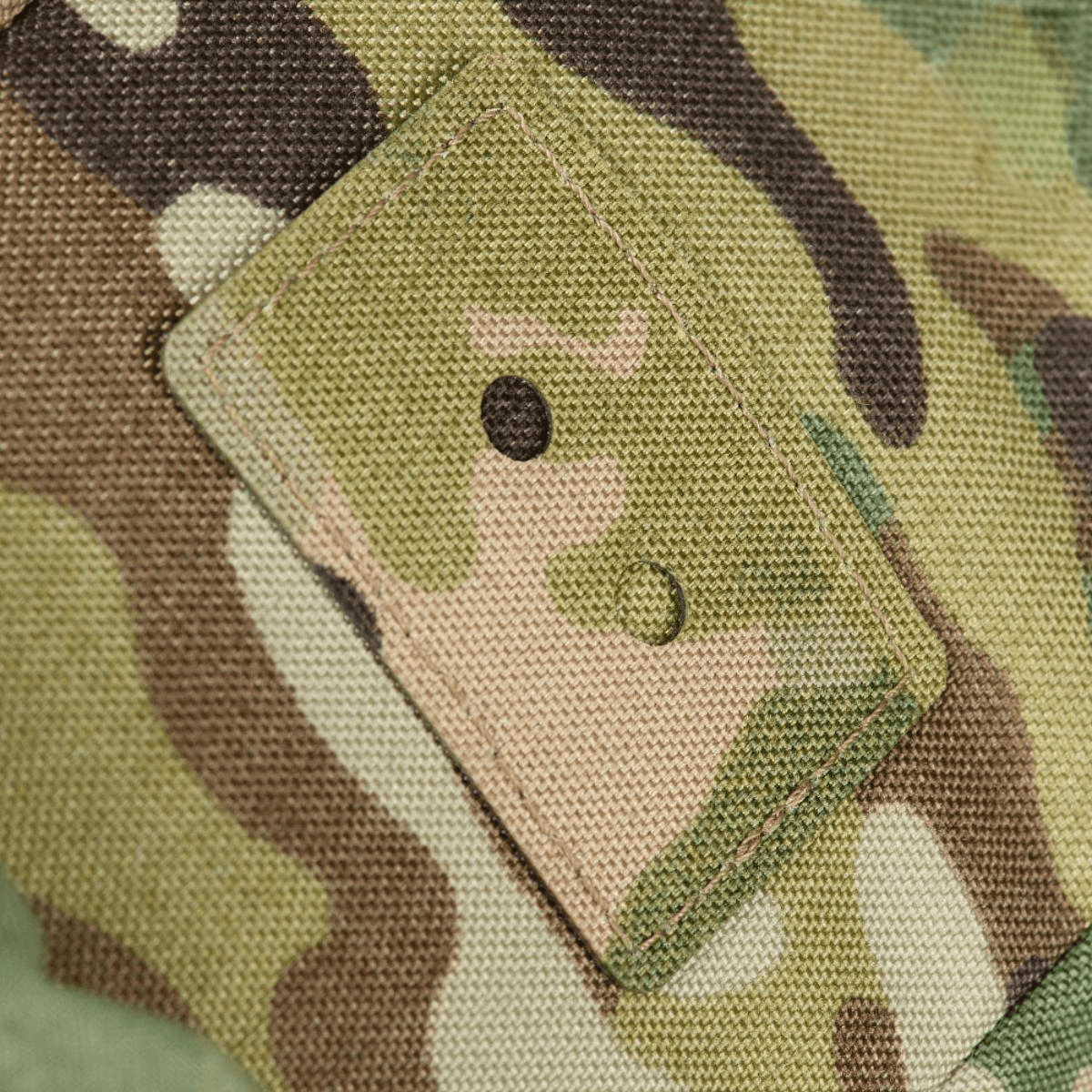Yksityiskohta M-Tac STURM Elite -repusta camo-kankaassa, Cordura-materiaali.
