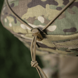 Lähikuva M-Tac STURM Elite -repusta camo-kuvioilla ja nyörilukolla. Valmistettu Cordura-materiaaleista taktiseen käyttöön.