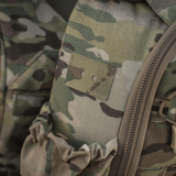 M-Tac STURM Elite -reppu camo-kuosissa joustavilla sivutaskuilla ja YKK- sekä Woojin Plastic -komponenteilla.