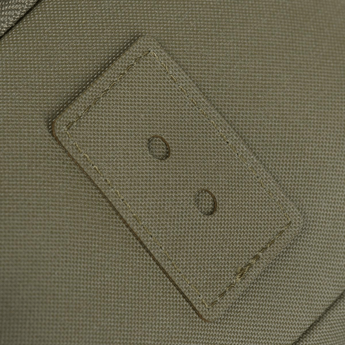 Yksityiskohta M-Tac STURM Elite -repusta Cordura-materiaalista, näyttää lujan ompeleen ja materiaalin.