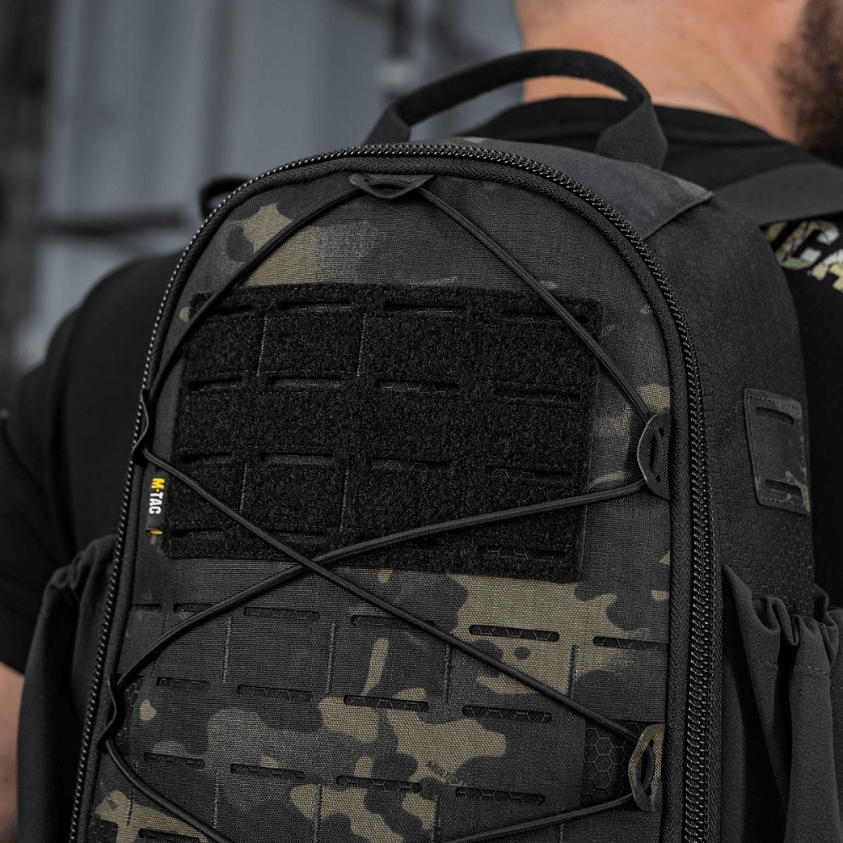 M-Tac STURM Elite -reppu mustassa maastokuviossa, MOLLE Laser Cut -paneelilla, ihanteellinen taktiseen käyttöön ja lyhyille kenttäretkille, valmistettu Cordurasta.