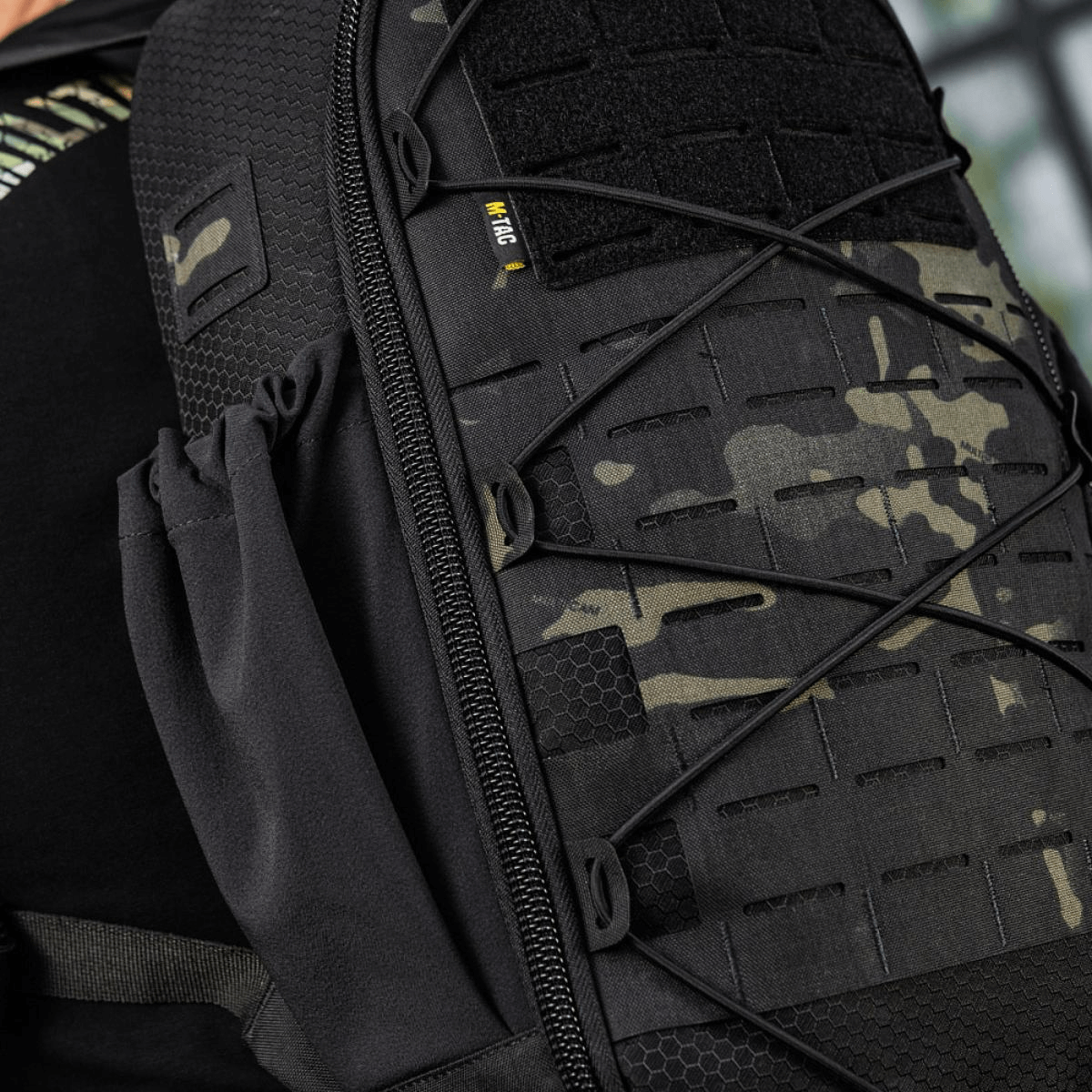 M-Tac STURM Elite -reppu MOLLE Laser Cut -etupaneelilla ja joustavilla sivutaskuilla taktiseen säilytykseen ja varusteiden kuljetukseen.
