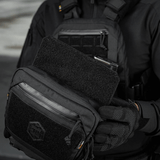 M-Tac Large Elite Gen.II -olkalaukku Cordura 500D:stä ja YKK-vetoketjuilla, näyttää etu-Velcro-paneelin logolla.