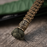 M-Tac Knife Lanyard Celtic, punottu paracord kelttikuvioinnilla, tyylikäs ja käytännöllinen lisä veitsille, varusteille ja taskulampuille.