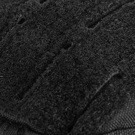 Yksityiskohta M-Tac Assault Pack Laser Cutin MOLLE-järjestelmästä kestävässä polyesterissä.