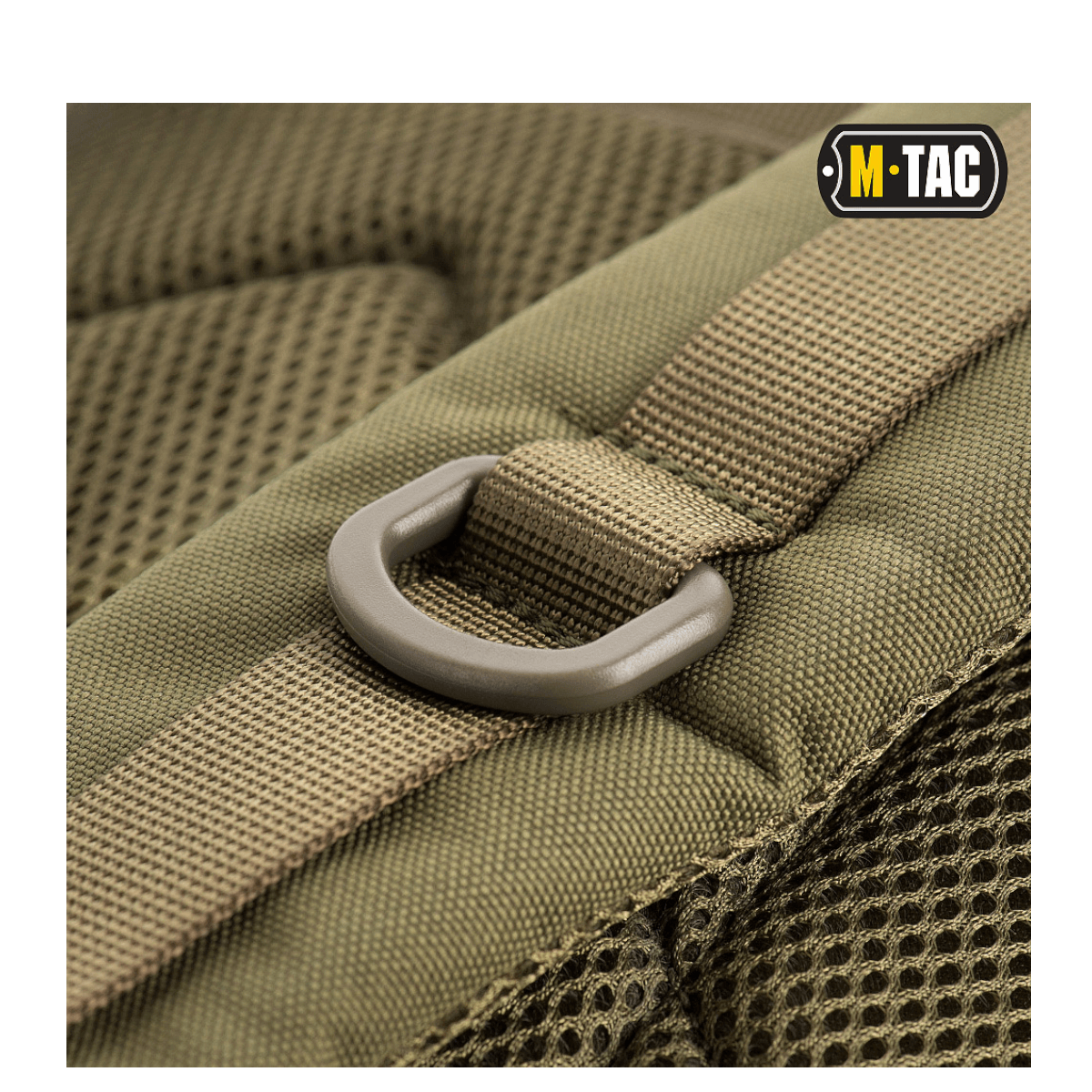 Yksityiskuva M-Tac Large Assault Pack -repusta, MOLLE-kiinnitys ja metallirengas.