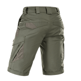 M-Tac Shorts Aggressor Gen.II Flex vihreänä, takaa kuvattuna, näyttää ripstop-materiaalin ja taktisen muotoilun taskuineen ja vyölenkkeineen.