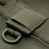 Lähikuva M-Tac Shorts Aggressor Gen.II Flexistä ripstop-materiaalilla ja Teflon-pinnoitteella, sopii harjoitteluun ja vapaa-aikaan, kulutusta kestävä muotoilu.