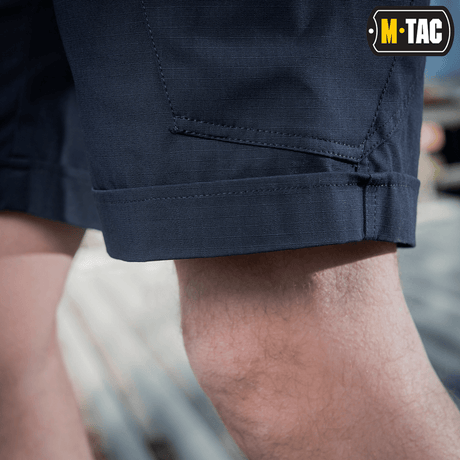 M-Tac Shorts Aggressor Short tummansinisenä, polvipituiset, ihanteelliset aktiiviseen käyttöön. Joustava polycotton rip-stop -materiaali. Täydellinen lämpimiin päiviin.