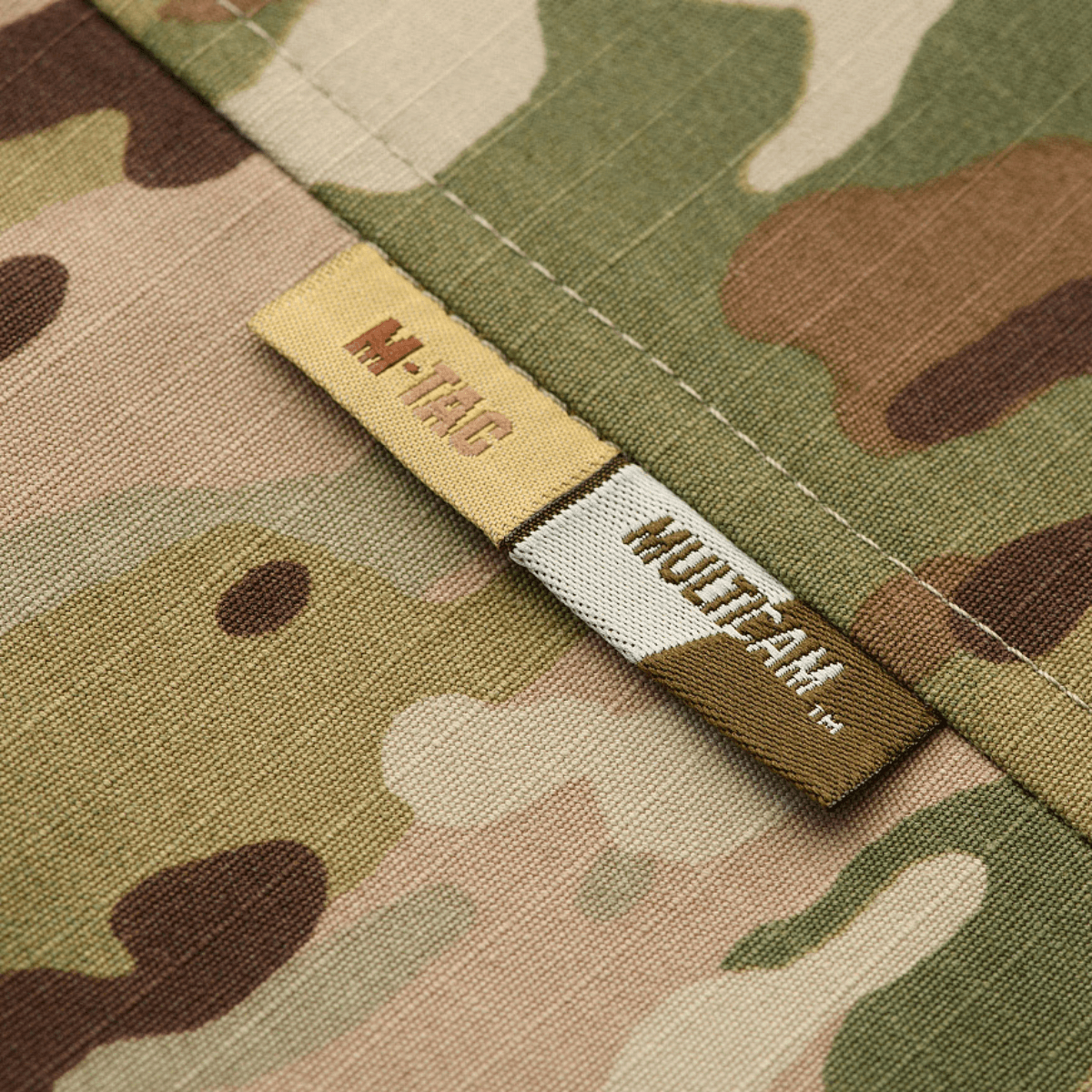 M-Tac Military Elite NYCO -takki MultiCam-kuosissa, NIR- ja Teflon-käsitelty American NYCO rip-stop -materiaali, lähikuva rakenteesta