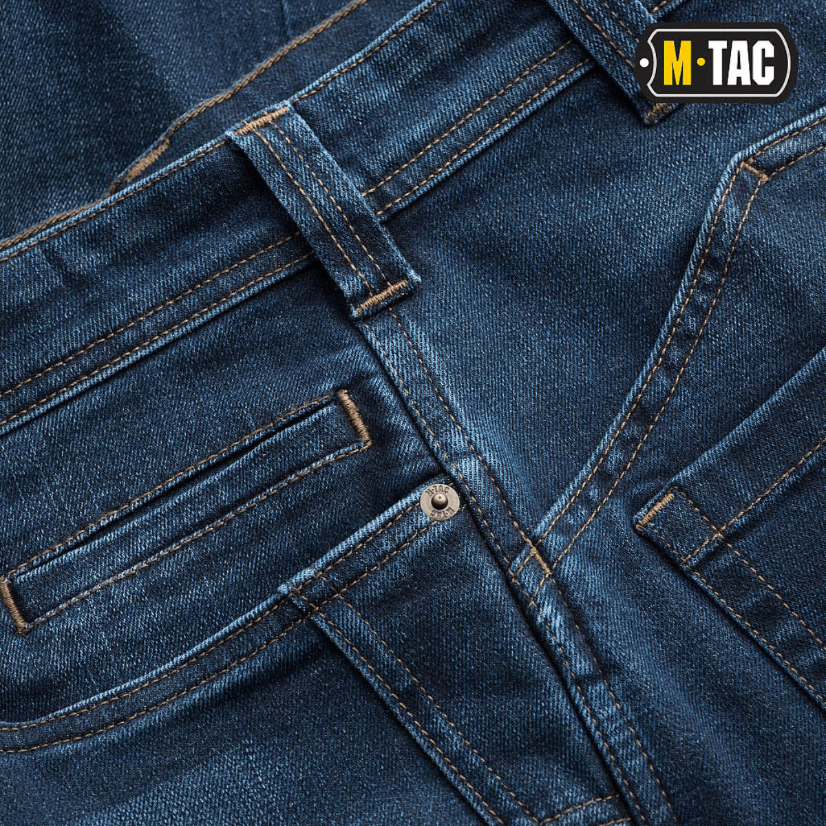 Lähikuva M-Tac Tactical Gen.I Regular Fit -farkuista, fokusissa yksityiskohdat ja ompeleet.