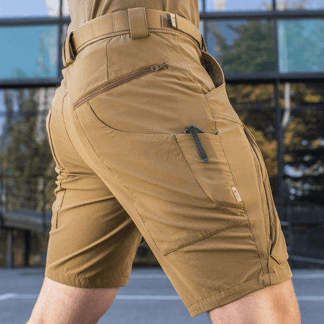M-Tac Shorts Rubicon Flex tummanoliivinvihreät lähikuvassa, näkyvät cargotaskut ja urheilullinen istuvuus.