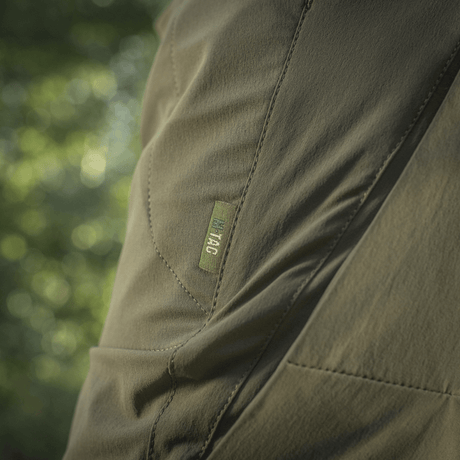 M-Tac Shorts Rubicon Flex tummanoliivinvihreät, cargotaskut, valmistettu vettä hylkivästä nylonista ja spandexista, sopii kesään ja mukavuuteen.