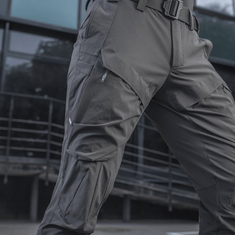M-Tac Rubicon Flex -housut harmaana, ergonominen muotoilu ja innovatiivinen cargo-tasku, ihanteelliset harjoitteluun, työhön ja vapaa-aikaan.