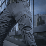 M-Tac Rubicon Flex -housut modernilla 4-Way Stretch -kankaalla ja innovatiivisella cargo-taskulla. Täydelliset harjoitteluun, työhön ja vapaa-aikaan.