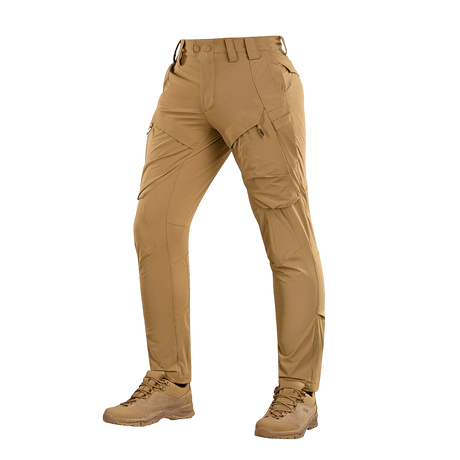 M-Tac Rubicon Flex -housut beigenä, suunniteltu harjoitteluun ja vapaa-aikaan innovatiivisella cargo-taskulla ja 4-Way Stretch -materiaalilla.