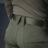 Yksityiskohta M-Tac Rubicon Flex -housuista innovatiivisella cargo-taskusuunnittelulla, tehty vedenpitävästä ja hengittävästä kankaasta.