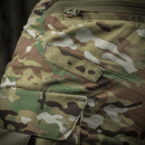 M-Tac-housut STURM NyCo Extreme Gen.II maastokuvioitu, korostaa mukavuutta ja kestävyyttä erilaisissa olosuhteissa.