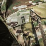 Lähikuva M-Tac-housuista STURM NyCo Extreme Gen.II maastokuosi ja Cordura 500D -vahvikkeet polvissa.