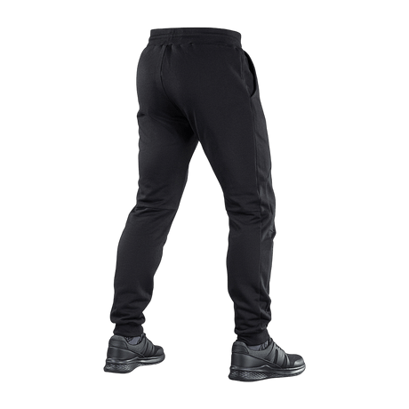 M-Tac Stealth Cotton -housut takaa nähtynä, urheiluhousut 100% puuvillaa, vyötärökuminauha ja sivutaskut, sopivat juoksuun ja arkeen.