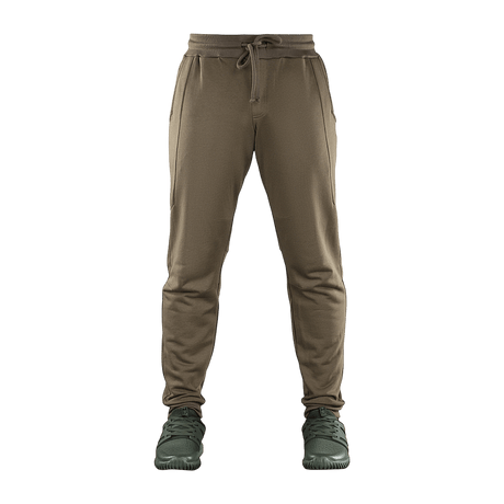 M-Tac Stealth Cotton -housut ruskeana kuminauhalla vyötäröllä ja sivutaskuilla, täydelliset urheiluun ja arkeen, valmistettu 100% puuvillasta.