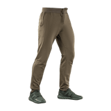 M-Tac Stealth Cotton -housut ruskeana, monikäyttöiset urheiluhousut kuminauhalla vyötäröllä ja sivutaskuilla, täydelliset juoksuun ja treeniin.