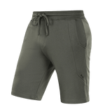 M-Tac Shorts Casual Fit Cotton vihreänä, kuminauhavyötäröllä, kahdella sivutaskulla ja hillityllä logolla mukavaan kesäkäyttöön.