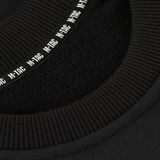 M-Tac Sweatshirt Cotton Hard, musta kaulus jossa näkyvä M-Tac-logo sisäpuolella. 100% puuvillaa mukavuutta ja lämpöä varten.