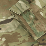 Yksityiskohta M-Tac Jakke Sturm NYCO Extreme Multicam-kuosissa, valmistettu kevyestä, kestävästä kankaasta, korkea hengittävyys.