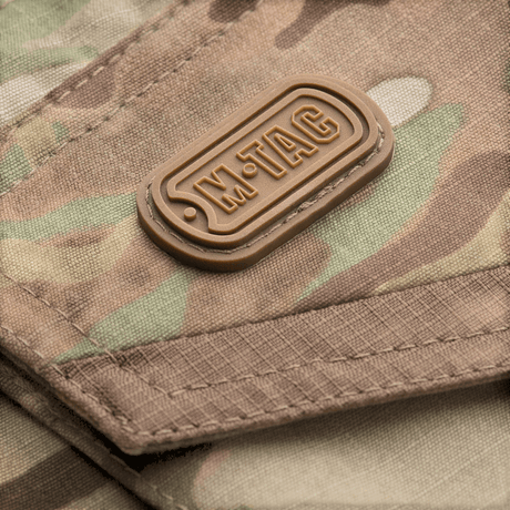 M-Tac housut Aggressor Elite NYCO multicam, kulutusta kestävä nylon-puuvillamateriaali ja M-Tac kumilogo, galleria-asento 1.